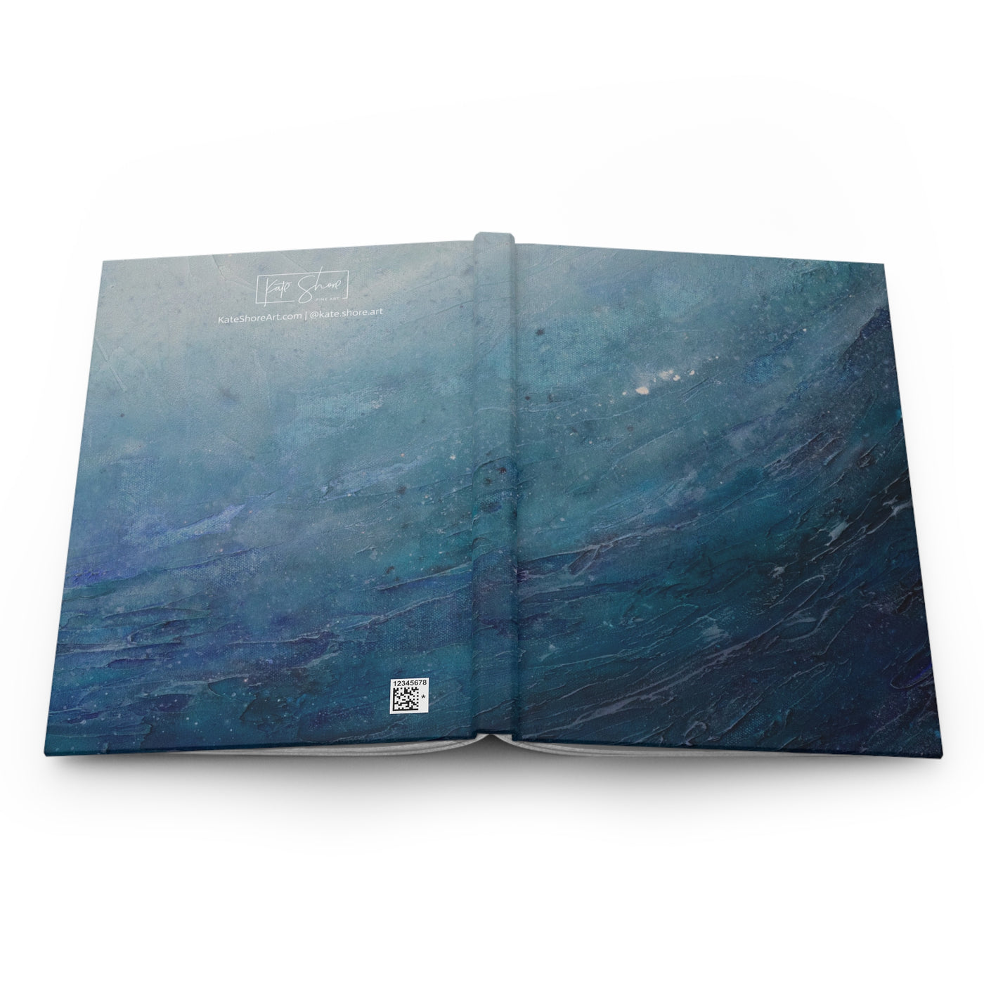 Open notebook with blue marbled design on a white background a great gift for beach lovers