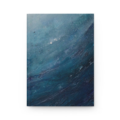 Blue marbled notebook on a white background